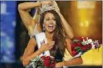  ?? NOAH K. MURRAY — THE ASSOCIATED PRESS FILE ?? Miss America Cara Mund, shown above, said in a letter sent to former Miss Americas on Friday that she has been bullied, manipulate­d and silenced by the pageant’s current leadership, including chairwoman Gretchen Carlson.