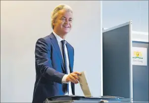  ?? AP PHOTO ?? PVV party leader and firebrand anti-Islam lawmaker Geert Wilders casts his ballot for Dutch general elections in The Hague, Netherland­s, Wednesday.