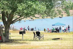  ?? NICK SMIRNOFF / FOR TEHACHAPI NEWS / FILE ?? Anglers enjoy the TVPRD 2023 Fishing Derby at Brite Lake. This year’s event is set for May 18.
