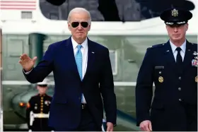  ?? (AP Photo/ Susan Walsh) ?? President Joe Biden waves as he walks towards Air Force One at Andrews Air Force Base, Md., Tuesday, Feb. 28, 2023, as he heads to Virginia Beach, Va., to talk about healthcare.