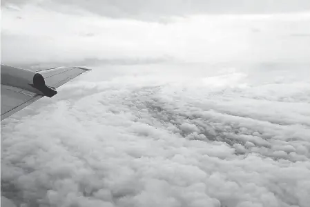  ?? 2005 PHOTO BY VALERIE ROCHE/FORT MEYERS NEWS-PRESS ?? Hurricane Katrina can be seen from the window of a NOAA Aircraft Operations WP-3D Orion plane.