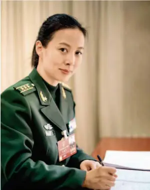  ??  ?? Wang Yaping, deputy to the National People’s Congress and China’s second female astronaut entering space, is proud to be China’s first “space teacher.” by Wan Quan