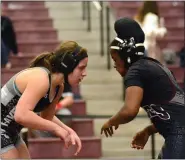  ?? BILL RUDICK — FOR MEDIANEWS GROUP ?? Strath Haven’s Hannah Spielman, left, and Chichester’s Dymanique Jones eye each other in the 147-pound final at the PA girls wrestling championsh­ips on March 8. Spielman claimed an 8-2 decision to win gold.