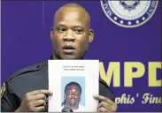  ??  ?? Memphis Police Director Toney Armstrong holds a picture of Tremaine Wilbourn during a news conference after identifyin­g him as the shooter who killed officer Sean Bolton. “You’re looking at a coward,” Armstrong said.