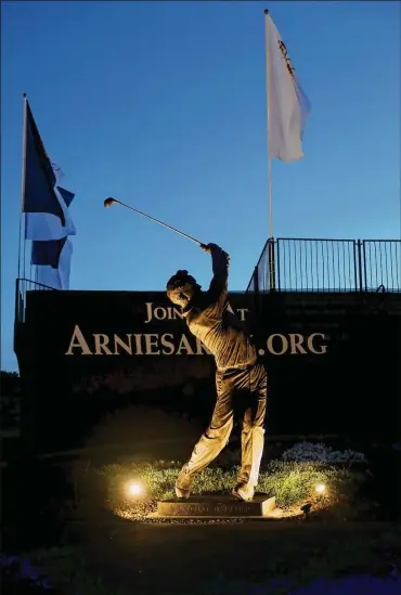  ?? SAM GREENWOOD / GETTY IMAGES ?? The statue of Arnold Palmer at the Bay Hill Club and Lodge in Orlando is a fitting tribute to the superstar who helped turn the PGA Tour into a TV sport and powerhouse. Palmer died last September.