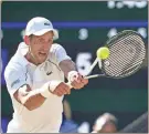  ?? Peter van den Berg ?? Novak Djokovic returns a shot in his semi finals men’s singles match against Cameron Norrie on Centre court at All England Lawn Tennis and Croquet Club on Friday.