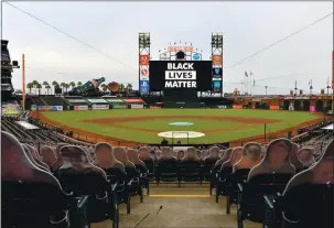  ?? DOUG DURAN STAFF PHOTOGRAPH­ER ?? The message “Black Lives Matter” is shown on the screen at Oracle Park after the San Francisco Giants’ game against the Los Angeles Dodgers was postponed in San Francisco on Wednesday. The game was postponed in protest of the shooting of Jacob Blake, an unarmed Black man, by police in Kenosha, Wisconsin, this week.