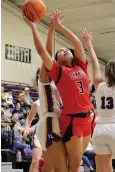  ?? The Sentinel-Record/James Leigh ?? Cutter Morning Star’s Selena Gasca (3) puts up a shot between Fountain Lake’s Reanna Norman, left, and Mary Drakes (13) during Wednesday’s game in the Fountain Lake Christmas Classic.