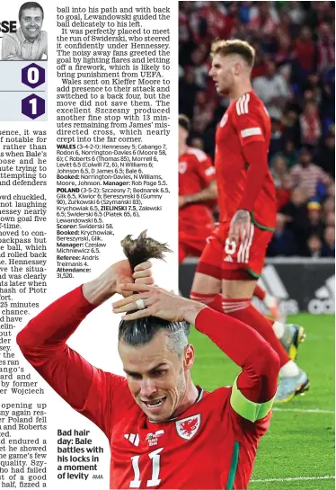  ?? AMA ?? Bad hair day: Bale battles with his locks in a moment of levity