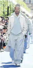  ??  ?? Models walk the runway during the Louis Vuitton Menswear Spring/Summer 2019 show in Paris.