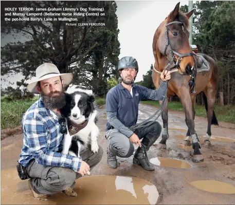  ?? Picture: GLENN FERGUSON ?? HOLEY TERROR: James Graham (Jimmy's Dog Training) and Murray Lamperd (Bellarine Horse Riding Centre) on the pot-holed Barry’s Lane in Wallington.