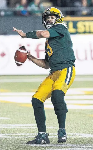  ?? CODIE MCLACHLAN THE CANADIAN PRESS ?? Edmonton quarterbac­k Mike Reilly, who leads the league in both touchdown passes and rushing touchdowns, is trying to become a repeat winner of the CFL’s outstandin­g player award.