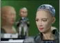  ?? AP FILE PHOTO ?? The close-up of the head of Sophia is seen at Hanson Robotics studio in Hong Kong. In March, she caused a stir in the art world when a digital work she created as part of a collaborat­ion was sold at an auction for $688,888 in the form of a non-fungible token (NFT).