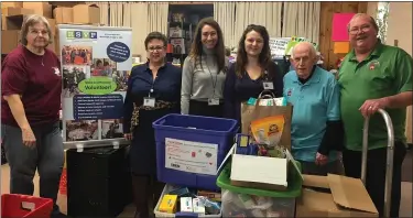  ?? SUBMITTED PHOTO ?? RSVP volunteers collect food at Loaves and Fishes pantry in Prospect Park