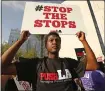  ?? AL SEIB — LOS ANGELES TIMES ?? Allen Mitchell Gardner of Community Coalition listens as PUSH L.A. Reimagine Protect and Serve massed for a news conference Wednesday in front of LAPD headquarte­rs.