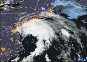  ?? NOAA VIA AP ?? This GOES-16 satellite image taken at 5:30 a.m. Friday shows Tropical Storm Fay as it moves closer to land in the northeast of the United States. Fay was expected to bring 2 to 4 inches of rain, with the possibilit­y of flash flooding in parts of the mid-Atlantic and southern New England, The U.S. National Hurricane Center said in its 5 a.m. advisory.