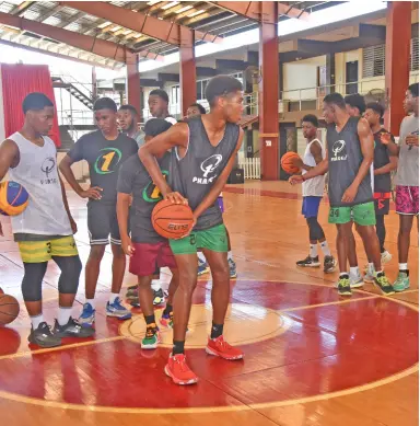  ?? PHOTOS BY ASHLEY ANGUIN ?? Players from P.H.A.S.E 1 Academy working on drills during a training session at the Montego Bay Community College in St James on Saturday, February 24, 2024.