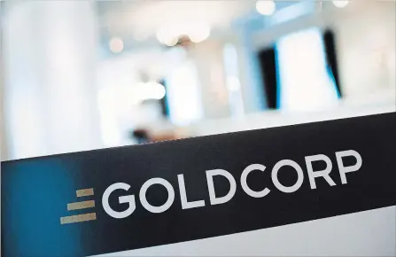  ?? AARON VINCENT ELKAIM THE CANADIAN PRESS ?? Newmont Mining Corp. will merge with rival Goldcorp Inc. accelerati­ng consolidat­ion in the global gold mining industry.