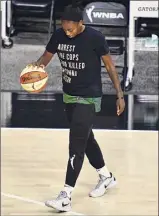  ?? Julio Aguilar / Getty Images ?? Jewell Loyd of the Seattle Storm, an advocate for social justice, helped raise awareness during the WNBA playoffs.