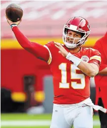  ?? TAMMY LJUNGBLAD THE KANSAS CITY STAR FILE PHOTO ?? While Kansas City quarterbac­k Patrick Mahomes signed a 10-year contract that could pay him a half-billion dollars by the end of it, he also was willing to give up some cash — and structure it in such a way — that the Chiefs could keep their entire core under contract.