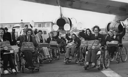  ?? Photograph: Keystone/Getty Images ?? Members of the British team at London Airport, en route to Tokyo for the Summer Paralympic Games, 4 November 1964.