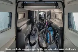  ??  ?? Some rear beds in campervans fold to one side, others rise electrical­ly