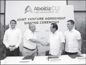  ??  ?? At the signing ceremony for the joint venture agreement are (from left) Aboitiz Land Inc. CEO David Rafael and AEV president and CEO Erramon Aboitiz, together with Cebu Landmaster­s president and CEO Jose Soberano III and EVP and COO Franco Soberano.