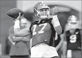  ?? NWA Democrat-Gazette/ANDY SHUPE ?? Arkansas quarterbac­k Nick Starkel threw three touchdown passes in Saturday’s second major scrimmage of training camp, drawing praise from Coach Chad Morris. “I thought Nick Starkel probably had one of his better days,” Morris said. “That was good to see.”
