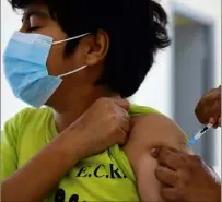  ?? (Photo AFP) ?? L’ouverture de la vaccinatio­n aux enfants âgés de 5 à 11 ans est prévue pour début janvier 2022.