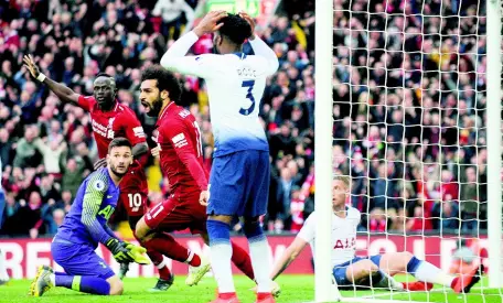  ?? AP ?? Liverpool’s Mohamed Salah (third left) celebrates after Tottenham’s Toby Alderweire­ld (right) scores an own goal during their English Premier League game at Anfield in Liverpool, England, yesterday.