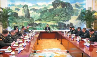  ?? FENG YONGBIN / CHINA DAILY ?? President Xi Jinping, who is also chairman of the Central Military Commission, meets with all Shanghai Cooperatio­n Organizati­on defense ministers in Beijing at the Great Hall of the People on Monday.