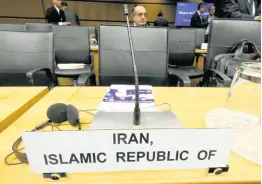  ?? AP ?? The empty chair of Iran’s ambassador to the Internatio­nal Atomic Energy Agency (IAEA) is pictured prior to the start of the IAEA board of governors meeting at the Internatio­nal Center in Vienna, Austria, on Monday, March 9.