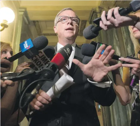  ?? MICHAEL BELL ?? Premier Brad Wall said Wednesday he didn’t have a lawyer present when he was questioned by Mounties about GTH land deals.