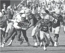  ?? ROB SCHUMACHER/THE REPUBLIC ?? Arizona State running back Eno Benjamin (3) runs for a touchdown against Washington State on Oct. 12 in Tempe.