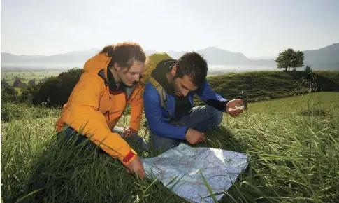  ??  ?? Everyone in your group should carry navigation tools and become familiar with the chosen route of travel. Photo: Flair Images/Dreamstime. com