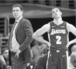  ?? JAE C. HONG/ASSOCIATED PRESS ?? Lakers coach Luke Walton, left, is being defended by NBA coaches in the wake of criticism from LaVar Ball, the father of Lakers rookie Lonzo Ball, right.