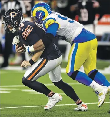  ?? Wally Skalij Los Angeles Times ?? AARON DONALD, sacking the Bears’ Andy Dalton, said other plays slipped away from him Sunday.