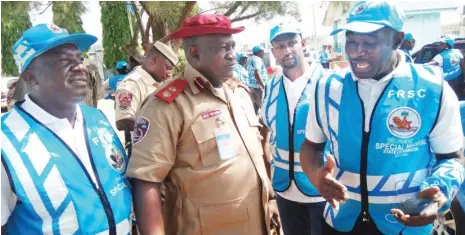  ?? Photo: Abubakar Sadiq Isah ?? The FCT FRSC sector commander, Ayuba Gora Wobin, middle, the FCT coordinato­r of the FRSC Special Marshal, Usman Adaji, right and Gwagwalada unit coordinato­r of Special Marshal, Alhaji Abdulyakee­n Hassan, during the Special Marshal’s National Patrol in...