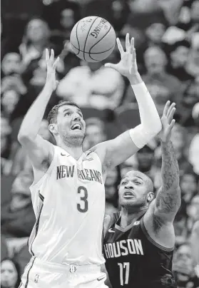  ?? Elizabeth Conley / Staff photograph­er ?? Pelicans forward Nikola Mirotic shredded the Rockets with 30 points on 11-of-20 shooting from the field in nearly 30 minutes on the court Wednesday night.