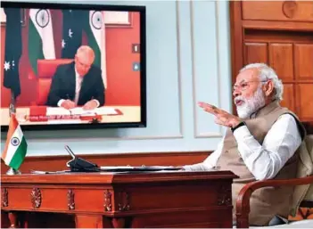  ?? PHOTOGRAPH: PIB ?? The Prime Minister, Narendra Modi with the Prime Minister of Australia, Scott Morrison at the India - Australia Leaders’ Virtual Summit, in New Delhi on June 4, 2020.