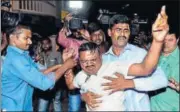  ?? PTI ?? A supporter of TTV Dinakaran tried to set himself ablaze as Delhi police arrived to issue a lookout notice against the leader.