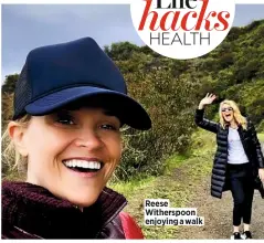  ??  ?? Reese Witherspoo­n enjoying a walk