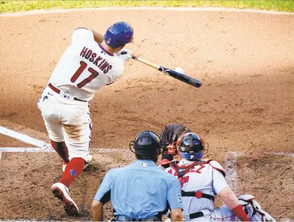  ?? MATT SLOCUM/AP ?? The Phillies’ Rhys Hoskins plays during a doublehead­er against the Red Sox last season in Philadelph­ia.