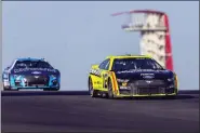  ?? STEPHEN SPILLMAN — THE ASSOCIATED PRESS ?? Ryan Blaney steers his car through Turn 10during practice for the NASCAR Cup Series auto race at Circuit of the Americas, Saturday, March 26, 2022, in Austin, Texas.