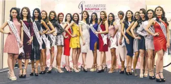  ?? ADIB RAWI YAHYA/ THESUN ?? The finalists of the Miss Universe Malaysia 2018 posing for the media at Pavilion, Kuala Lumpur yesterday.