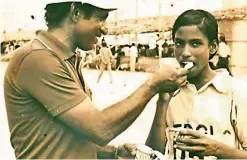  ?? — Twitter ?? Dronachary­a and Padma Shri awardee athletics coach O. M. Nambiar feeds his ward P. T. Usha in this file photo.