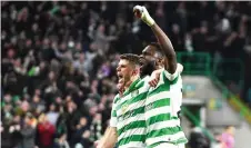  ?? — AFP photo ?? Celtic’s Scottish midfielder Ryan Christie (left) celebrates scoring the equalising goal with Celtic’s French forward Odsonne Edouard during the UEFA Europa League group E match between Celtic and Lazio at Celtic Park stadium in Glasgow, Scotland In this Oct 24, 2019 file photo.