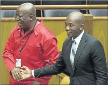  ??  ?? POLITICAL ADVERSARIE­S: EFF leader Julius Malema, left, and DA leader Mmusi Maimane in parliament