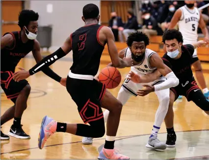  ?? GEORGE SPITERI — FOR MEDIANEWS GROUP ?? Josh Hines of Dakota draws the Roseville defense during a Division 1regional semifinal game at Troy.