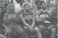  ?? JOE RONDONE/THE REPUBLIC ?? Suns players Chris Paul, from left, Mikal Bridges and Josh Okogie watch during a 132-100 loss to the Hawks on Wednesday.